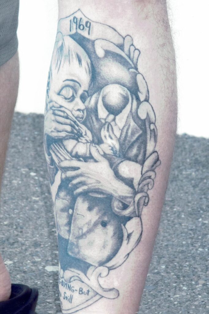 The prison tattoo described in the text.